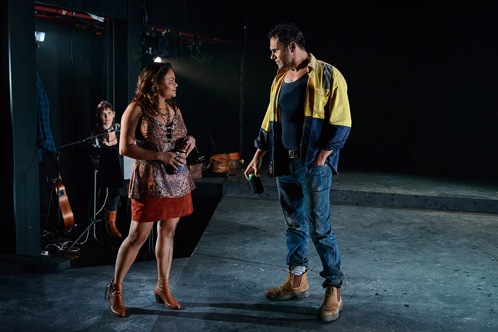 Production still for "Heart is a Wasteland". L-R: Anna Liebzeit (musician), Ursula Yovich as Raye, Aaron Pedersen as Dan. Photographer: Deryk McAlpin