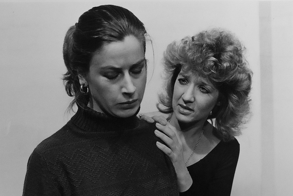 Production still for "Antigone". L-R: Belinda Davey (Ismene/Eurydice), Amanda Muggleton as Antigone. Photographer: Jeff Busby