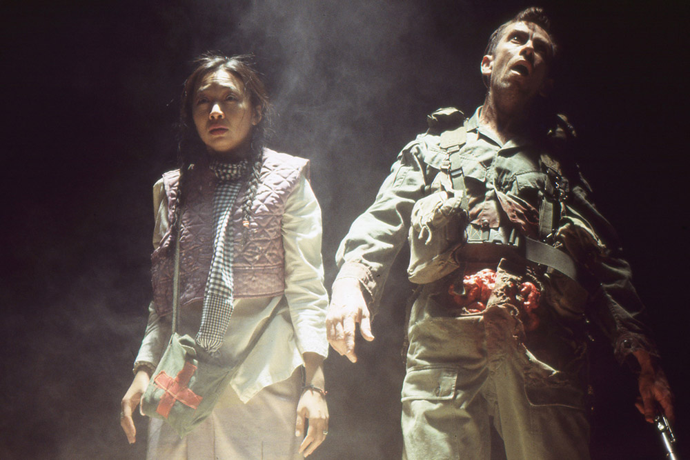 Production still for "Meat Party". L-R: Trang Nguyen as Mai, Matthew Crosby as Gabriel. Photographer: Jeff Busby