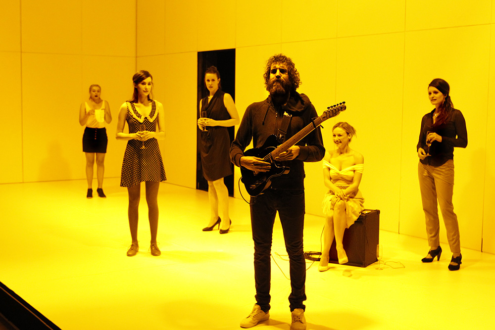 Production still for "Baal". L-R: Brigid Gallacher, Geraldine Hakewill, Katherine Tonkin, Thomas M. Wright, Lotte St Clair, Luisa Hastings Edge. Photographer: Jeff Busby