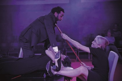 Production still for "Trustees". L-R: Hazem Shammas, Natasha Herbert. Photographer: Nicolai Khalezin
