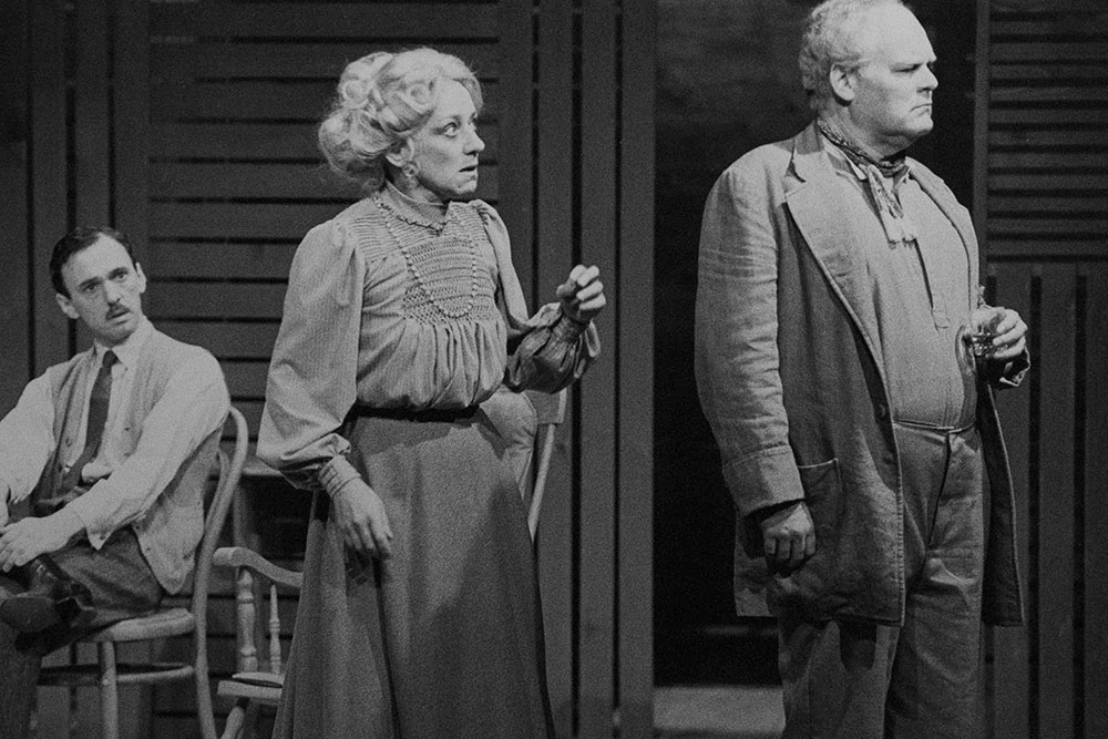 Production still for "Long Day's Journey into Night". L-R: William Zappa as Edmund, Monica Maughan as Mary, Malcolm Robertson as James. Photographer: Jeff Busby
