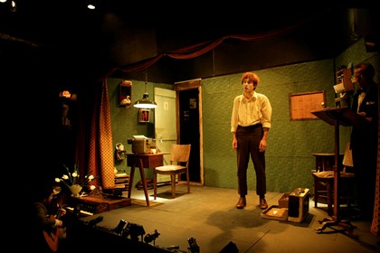 Production still from "The Black Swan of Trespass". L-R: Chris Kohn (on guitar), Christopher Brown, Gavan O'Leary. Photographer: Jeff Busby