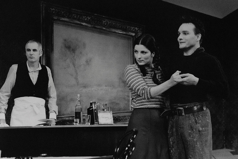 Production still for "Picasso at the Lapin Agile". L-R: Shane Bourne as Freddy, Jane Borghesi as Suzanne, Jeremy Sims as Picasso. Photographer: Jeff Busby