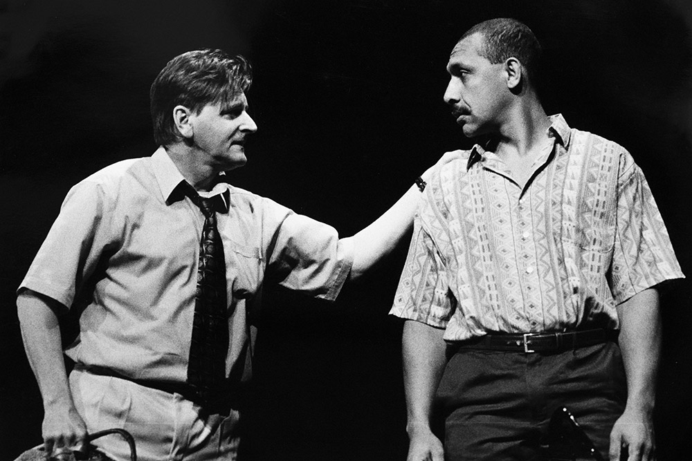 Production still for "Rising Fish Prayer". L-R: Robert Grubb as Ken Paterson, Theo Burns as Sam Tiko. Photographer: Jeff Busby