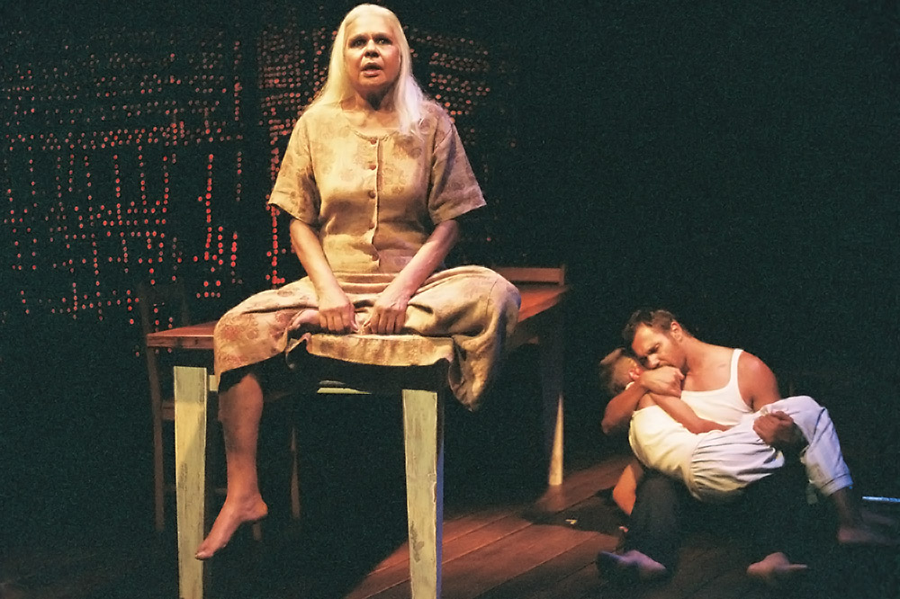 Production still for Belvoir St production of "Black Medea". L-R: Justine Saunders as the Chorus, Aaron Pederson as Jason. Photographer: Heidrun Lohr