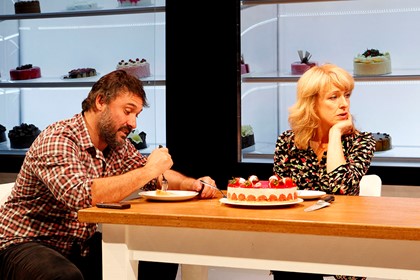 Production still for "Porn.Cake". L-R: Luke Elliot as Bill, Heather Bolton as Bella. Photographer: Jeff Busby 