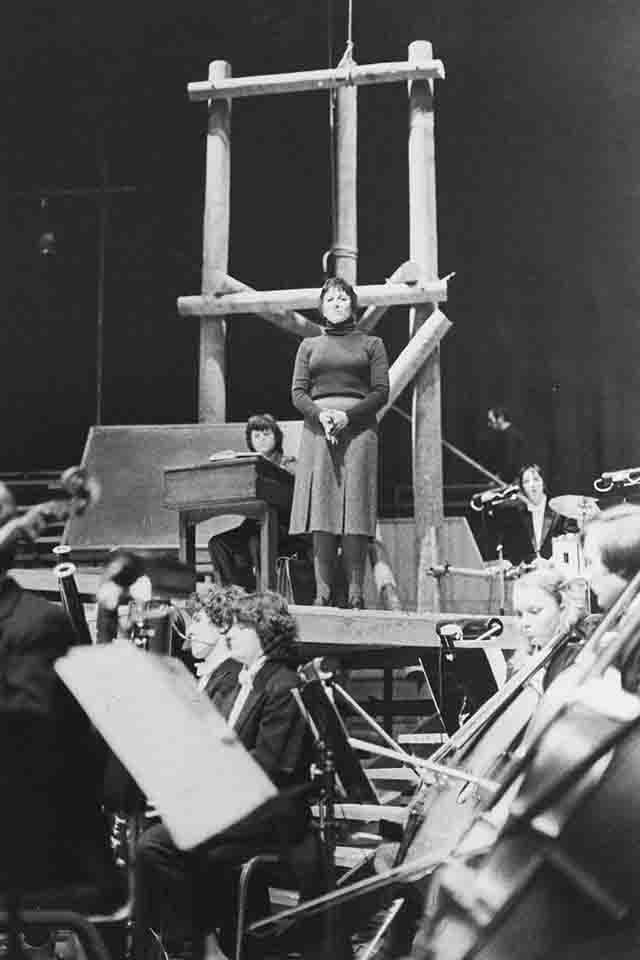 Production still from "Every Good Boy Deserves Favour". Lindy Davies as The Teacher (standing, centre). Photographer: David Parker