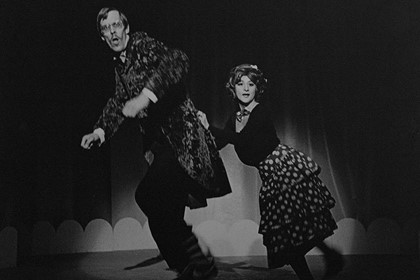 Production still for "The Ripper Show". L-R: Bruce Spence as Algernon P. Sharpe, Evelyn Krape as Edwina Sharpe. Photographer: Jeff Busby