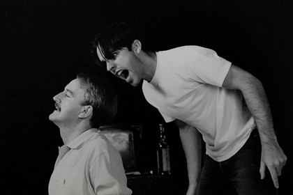 Production still for tour of "Sanctuary". L-R: William Gluth as Robert 'Bob' King, Felix Williamson as John Alderston. Photographer: Jeff Busby