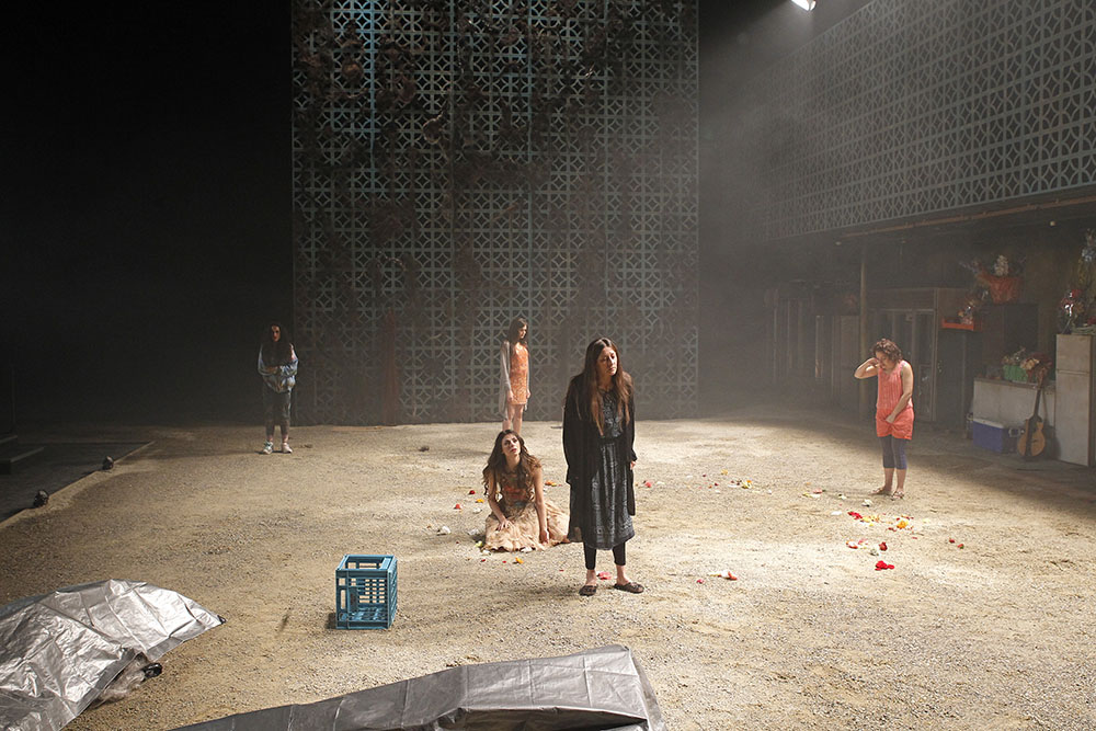 Production still for "Blood Wedding". L-R: Irene del Pilar Gomez as the Beggar Woman, Nicole Da Silva (standing) as the Wife, Silvia Colloca as the Bride, Mariola Fuentes as the Mother, Ruth Sancho Huerga as the Servant. Photographer: Jeff Busby